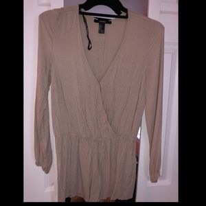Nude Long sleeved romper Size S